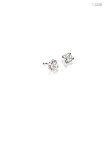 A Pair of Diamond Single-stone Earstuds, by Cartier