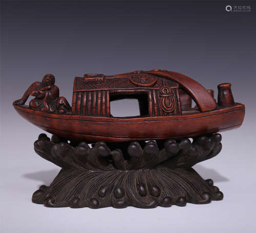 CHINESE BAMBOO CARVED MAN IN BOAT WITH ROSEWOOD BASE