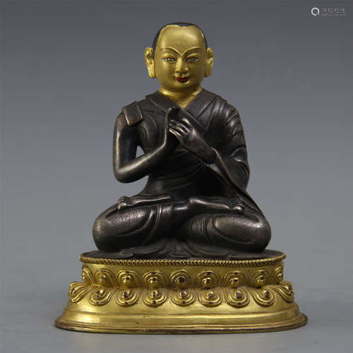 CHINESE PARTLY GILT BRONZE SEATED GURU