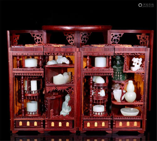 CHINESE ROSEWOOD TREASURE CASE WITH 28 PIECES OF JADE CARVINGS