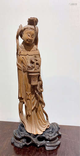 A HUANGYANG WOOD ORNAMENT OF A LADY