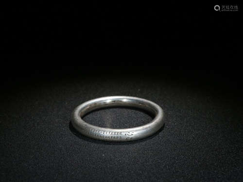 A STORY-TELLING SILVER BANGLE