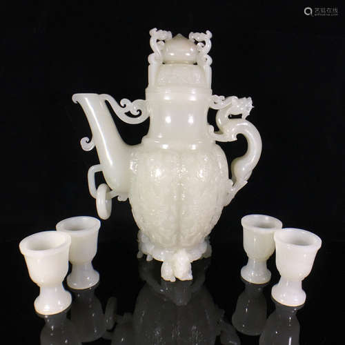 A HETIAN JADE TEAPOT WITH FOUR HETIAN JADE TEA CUPS