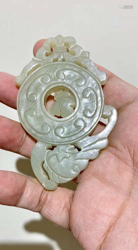 A WHITE HETIAN JADE ORNAMENT