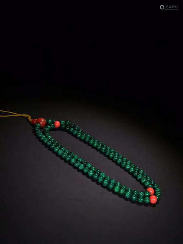 A BRACELET MADE OF 108 WALRUS IVORY BEADS