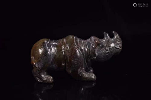 AN OLD JADE RHINO SHAPE ORNAMENT