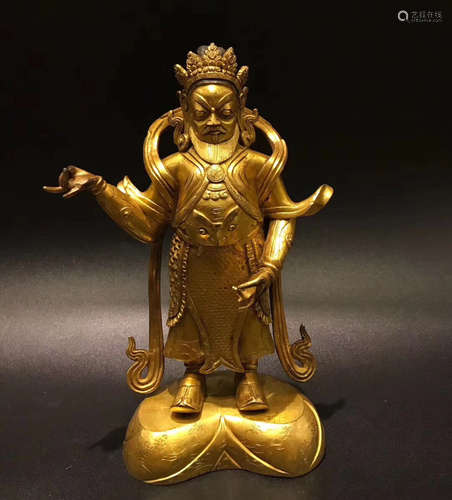 A GILT BRONZE BUDDHA FIGURE