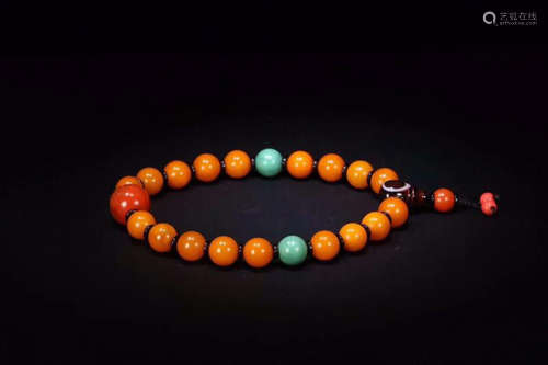 A TIBETAN AMBER AND TURQUOISE BRACELET