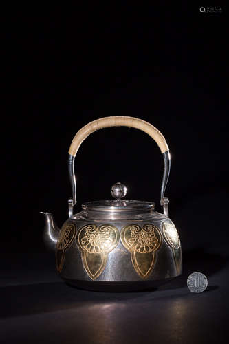 A GILT SILVER TEAPOT