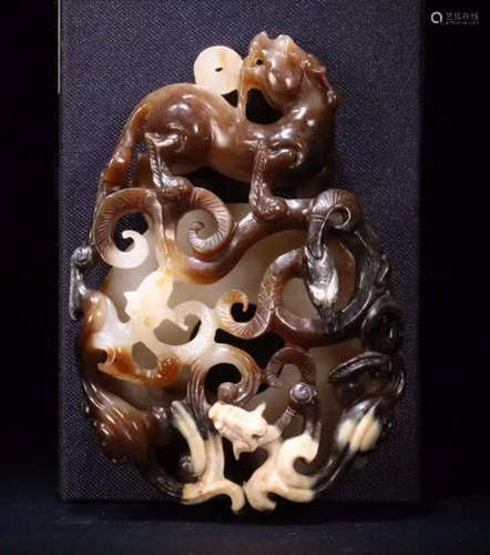 AN OLD JADE TABLET WITH DRAGON AND PHOENIX PATTERNS