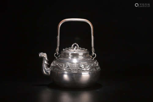 A SILVER TEAPOT WITH BEAST PATTERNS AND CHUNGUTANG MARKING