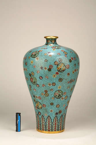 AN ENAMELED GILT BRONZE VASE