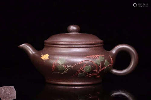 A ZISHA TEAPOT WITH GOLD PAINTING AND MARKING