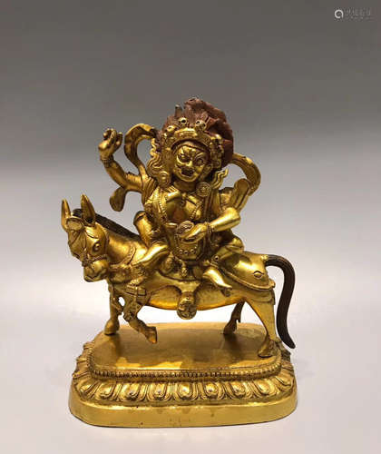 A GILT BRONZE FEMALE BUDDHA FIGURE