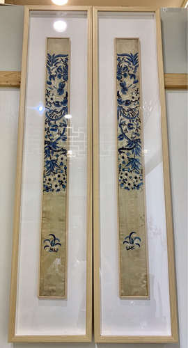 A PAIR OF BLUE AND WHITE VERTICAL PAINTINGS