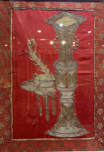 A RED PAINTED EMBROIDERY