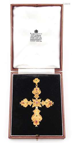 A large unmarked yellow gold ruby & emerald cross or crucifix pendant, 3.5ins. (9cms.) long,