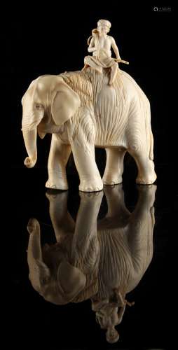 Property of a gentleman - a Japanese carved ivory okimono modelled as a standing elephant with