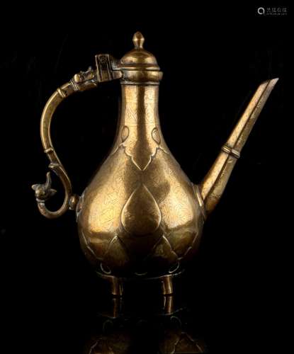 Property of a gentleman - an Islamic bronze ewer, 18th / 19th century, with engraved floral