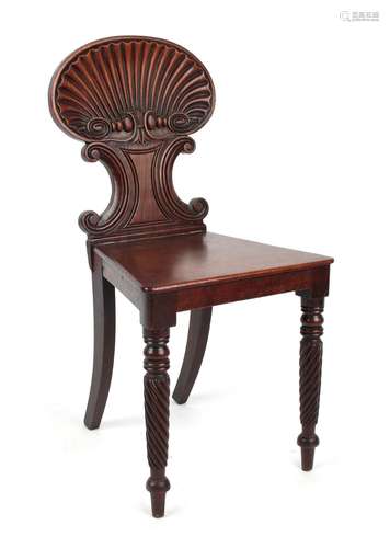 Property of a lady - an early 19th century Regency period mahogany hall chair with carved shell back