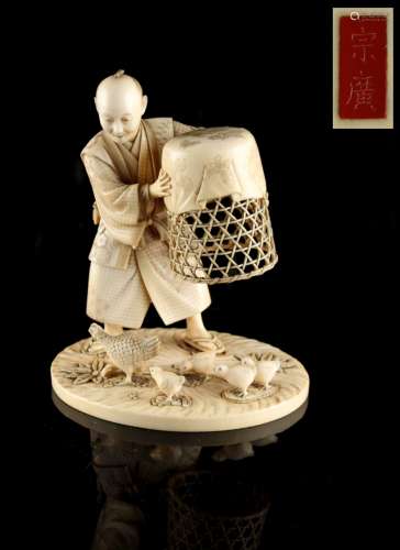 Property of a lady - a Japanese carved ivory okimono depicting a man holding a cage above