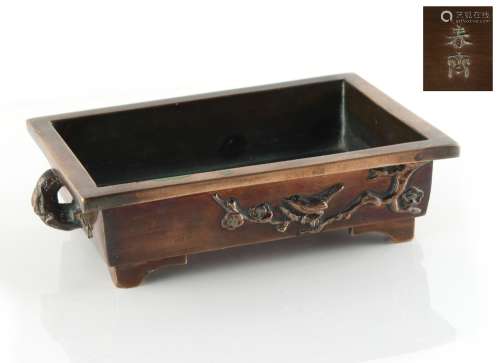Property of a gentleman - a Japanese bronze rectangular planter, decorated in relief with a bird