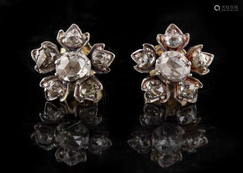 A pair of diamond flowerhead cluster earrings, with post & butterfly fastenings, each set with six