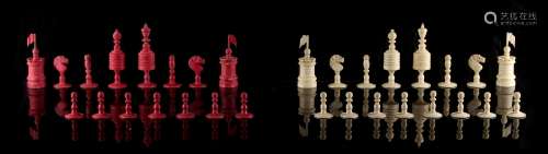 Property of a gentleman - a 19th century English bone 'Old English' pattern chess set, one red