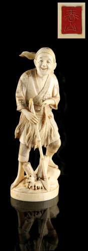Property of a lady - a Japanese carved ivory okimono depicting a fisherman harpoonist, loss to top