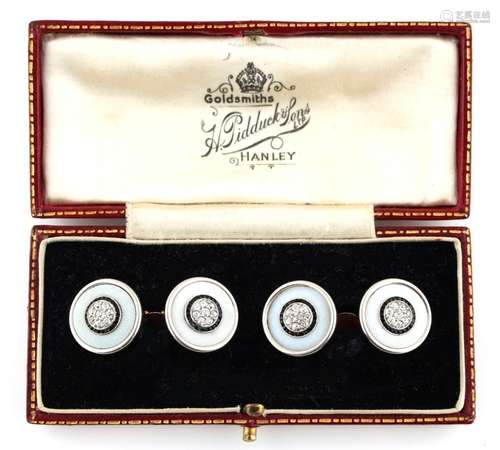 A pair of yellow gold black onyx & diamond circular panelled cufflinks, approximately 11.8 grams