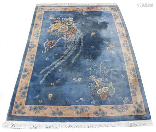 Property of a gentleman - a Chinese hand knotted wool carpet, late 20th century, with blue ground,