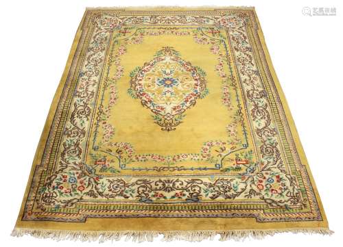 Property of a gentleman - an Indian hand knotted wool carpet with pale yellow ground, 143 by 108ins.