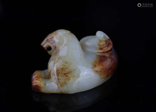 A Chinese Carved Jade Foo-Dog