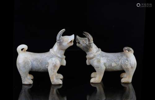 A Pair of Chinese Carved Jade Dogs