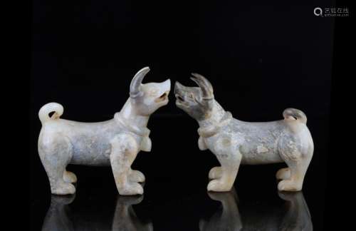 A Pair of Chinese Carved Jade Dogs