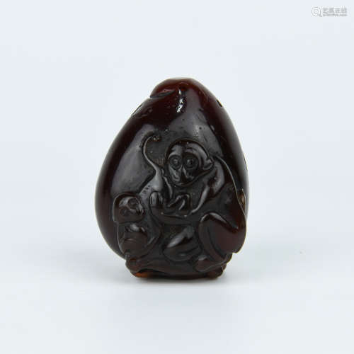 A Chinese Carved Amber Pendant
