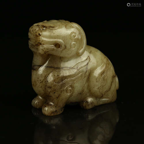 A Chinese Carved Jade Foo-Dog