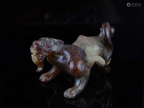 A Chinese Carved Jade Foo-Dog