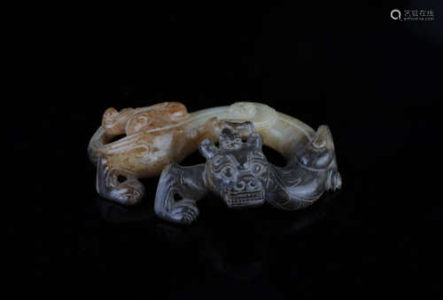 A Chinese Carved Jade Foo-Dog