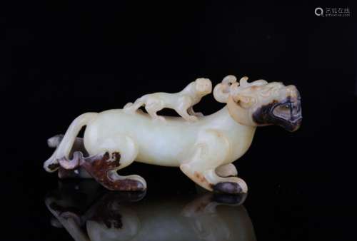 A Chinese Carved Jade Foo-Dog