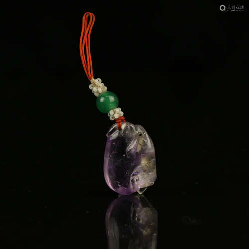 A Chinese Carved Purple Rock Crystal Pendant