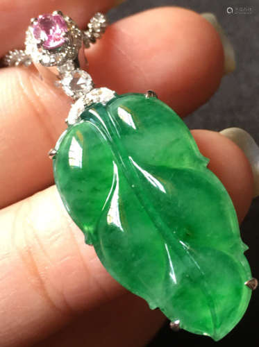 A GREEN JADEITE CARVED LEAF PENDANT, TYPE A