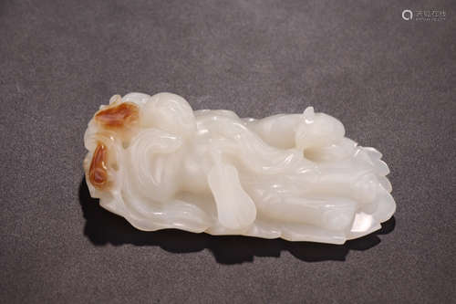 A HETIAN JADE CARVED BEAUTY SHAPED PENDANT