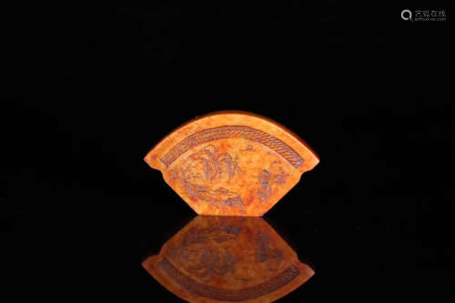 A SOASTONE CARVED SECTOR SHAPED SEAL