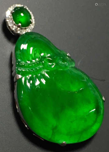 A GREEN JADEITE CARVED LUCKY BAG PENDANT, TYPE A