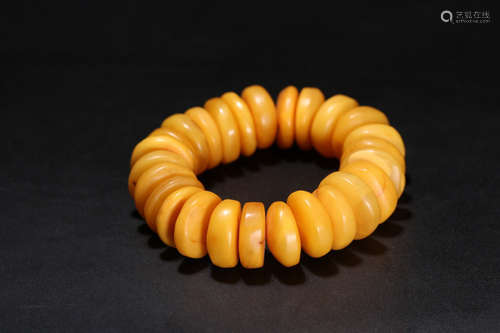 A BEESWAX CARVED BEADS STRING BRACELET