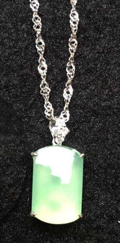 A GREEN JADEITE CARVED SQUARE PENDANT, TYPE A