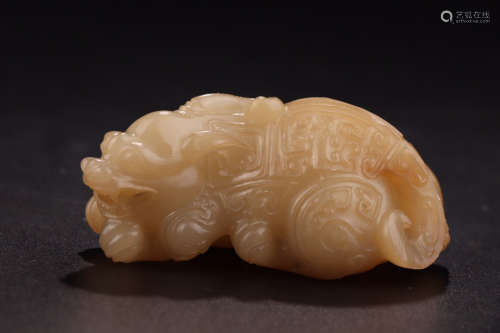 A HETIAN JADE CARVED BEER SHAPED PENDANT