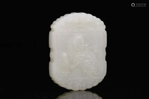 A HETIAN WHITE JADE CARVED LION PATTERN PENDANT