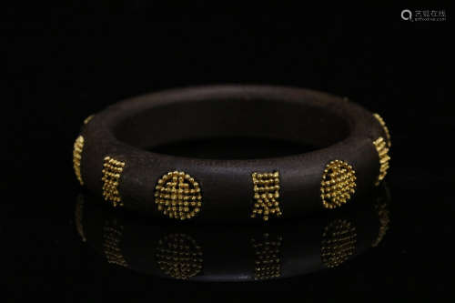 A CHENXIANG WOOD CARVED BANGLE